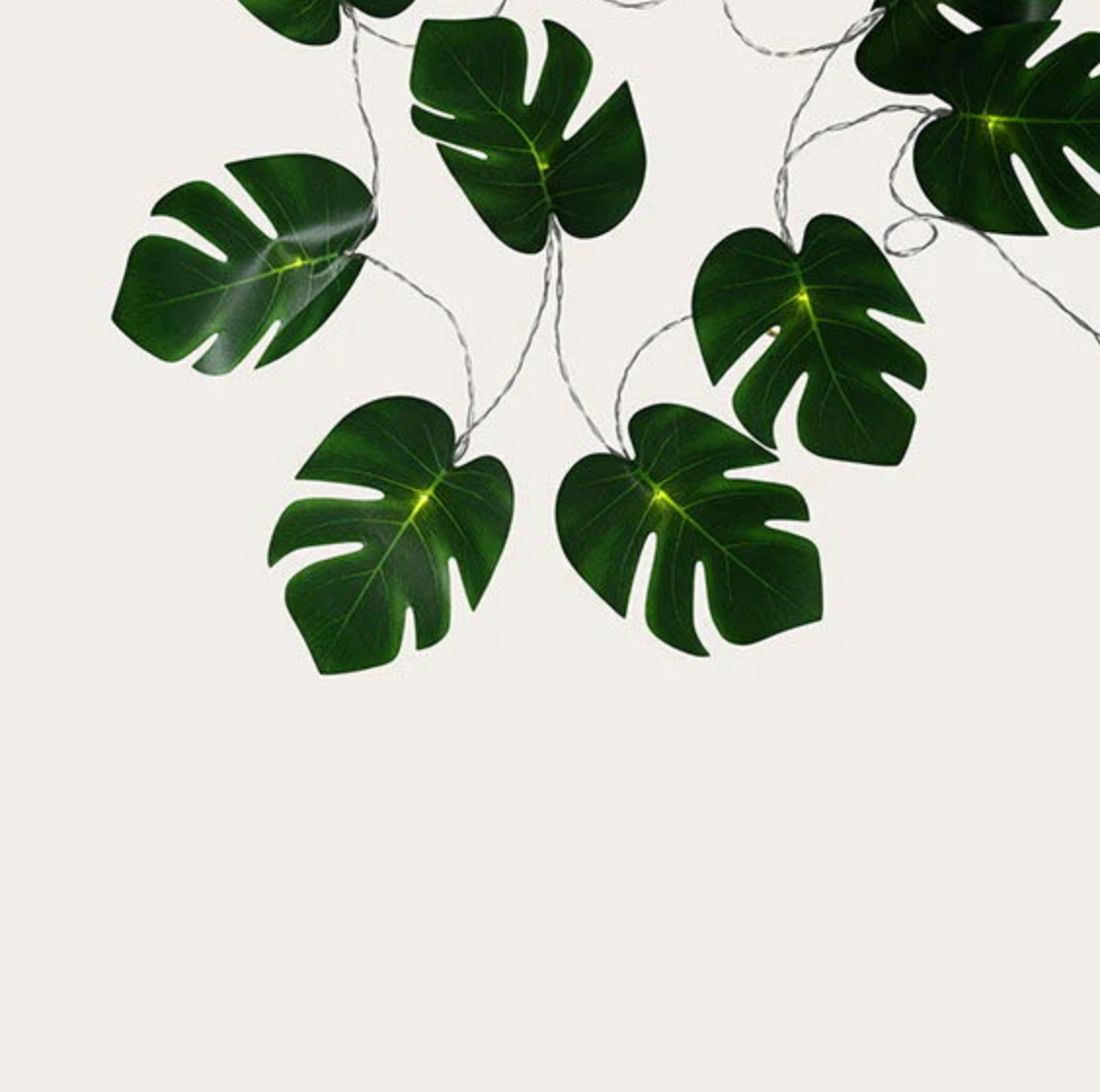 Lyskæde med grønne blade