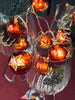 Lyskæde med små julekugler