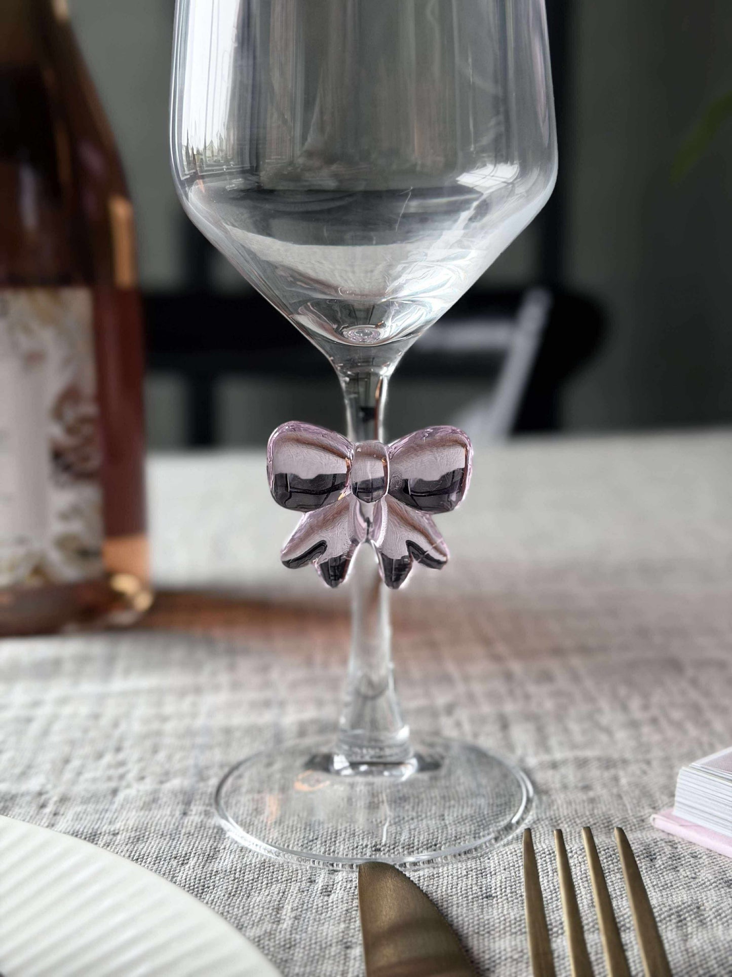 Glas med sløjfe