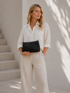 Clutch med perforeret mønster - black