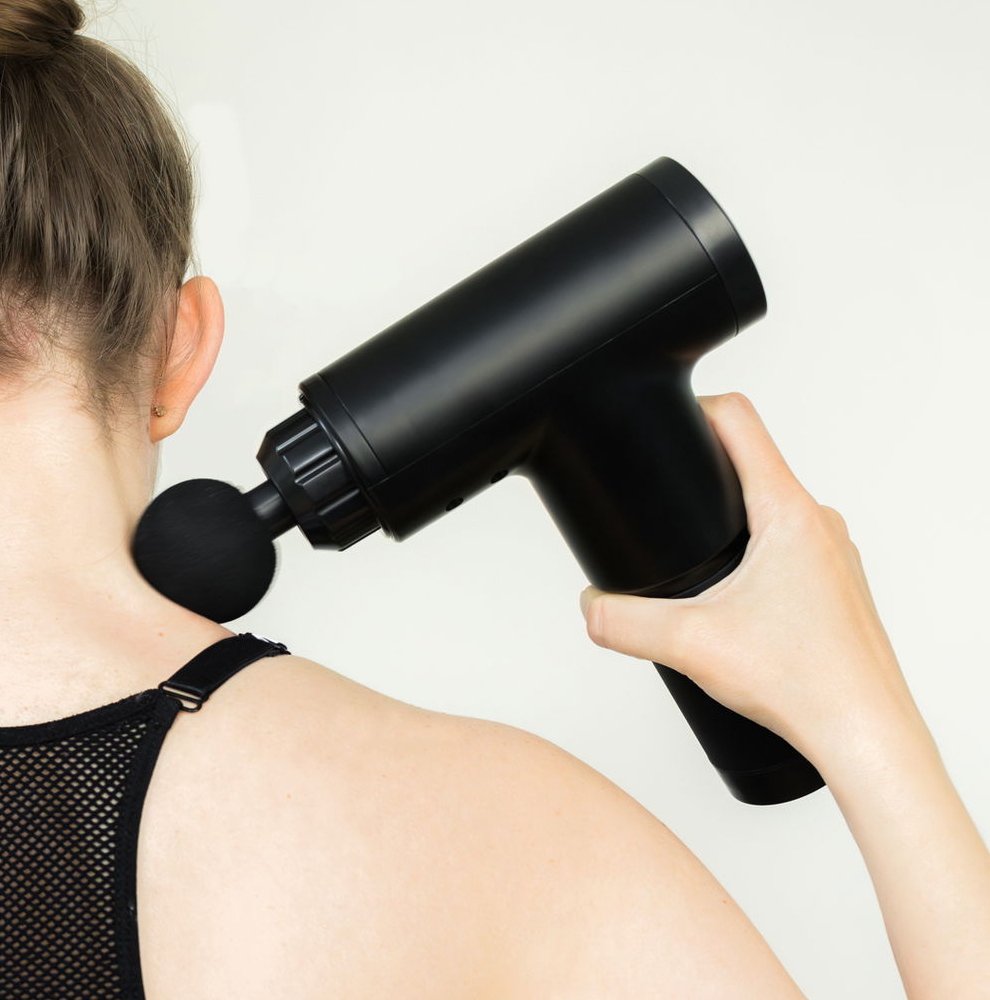 Massagepistol med 4 hoveder