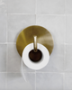 Toiletrulleholder i messingfinish