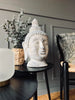 Buddha i flotte lyse nuancer